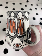 Load image into Gallery viewer, Spinning Cat Eyes