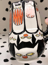Load image into Gallery viewer, Spinning Cats with Yellow Eyes
