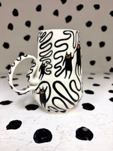 Load image into Gallery viewer, Spinning Squiggle Cats Mug