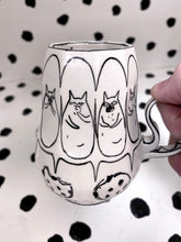 Load image into Gallery viewer, Spinning Cookie Eater
