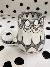 Load image into Gallery viewer, Spinning Cat Eyes
