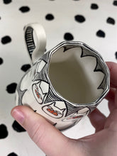 Load image into Gallery viewer, Spinning Cat Eyes
