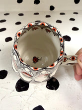 Load image into Gallery viewer, Spinning Cat Eye Mug
