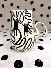 Load image into Gallery viewer, Spinning Squiggle Cats Mug
