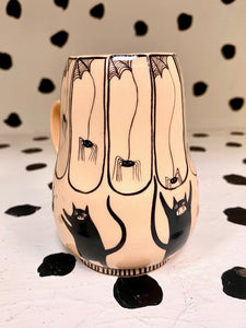 Floating Spider Spinning Mug